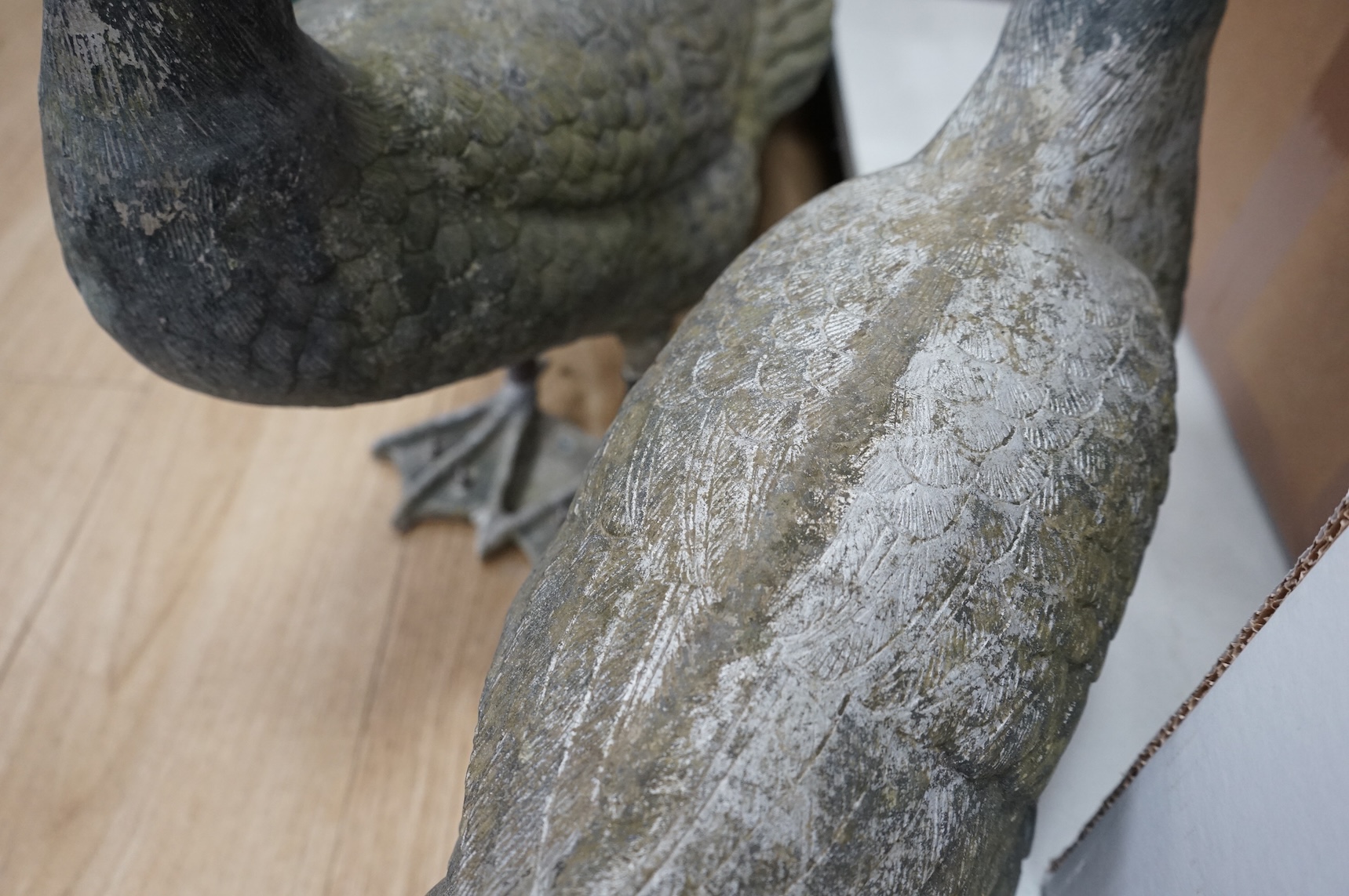 A pair of silvered metal ‘geese’, 70cm